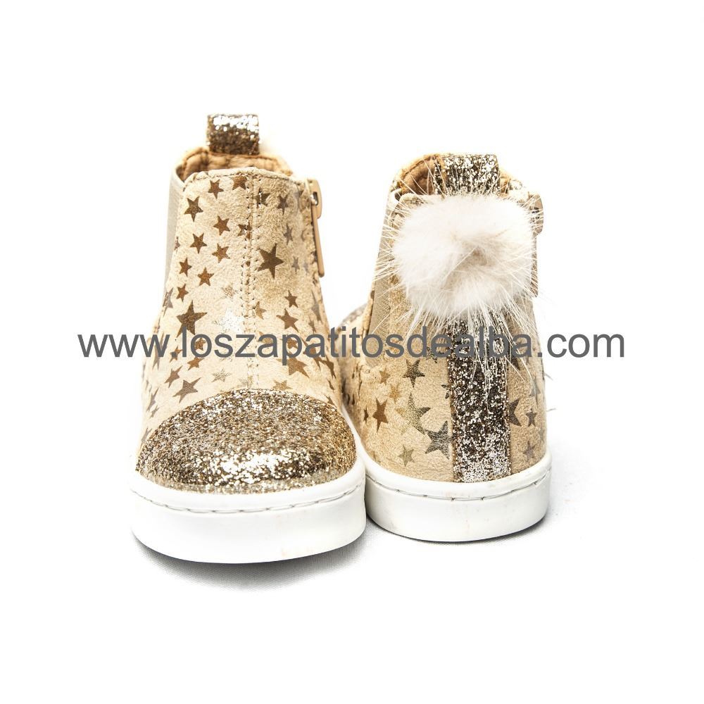 botas doradas para niña